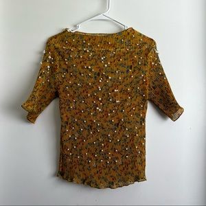 Sheer mustard top with white beads